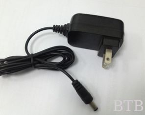 China fuente de alimentación de conmutación 9V 1A cargador centro de montaje adaptador proveedor