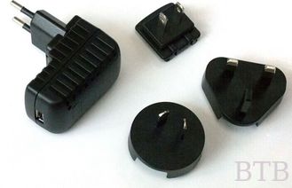China Adaptador de alimentación USB de 5V 1A conector intercambiable Adaptador AC DC proveedor